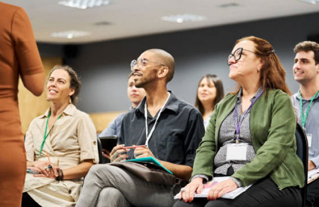 Employees listening to a presentation